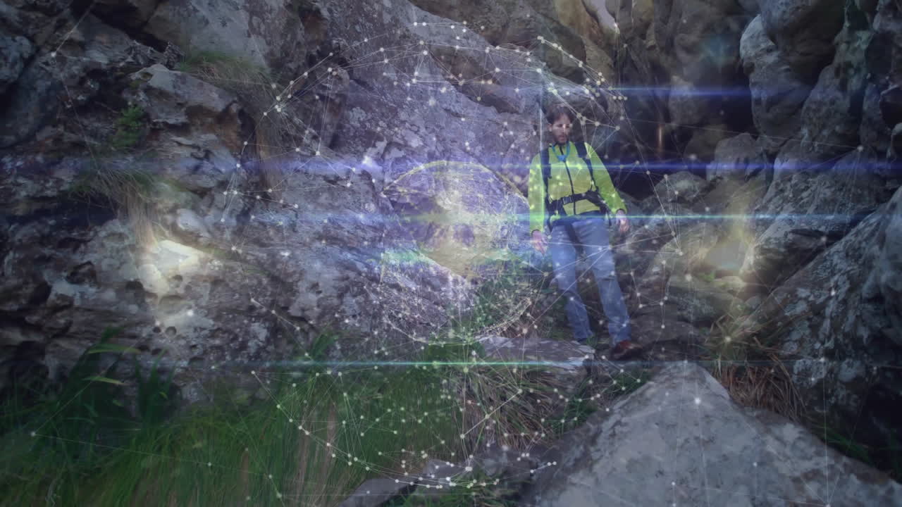 Mid-adult male hiker descending trail, showing network overlay with nodes and lines for tech theme