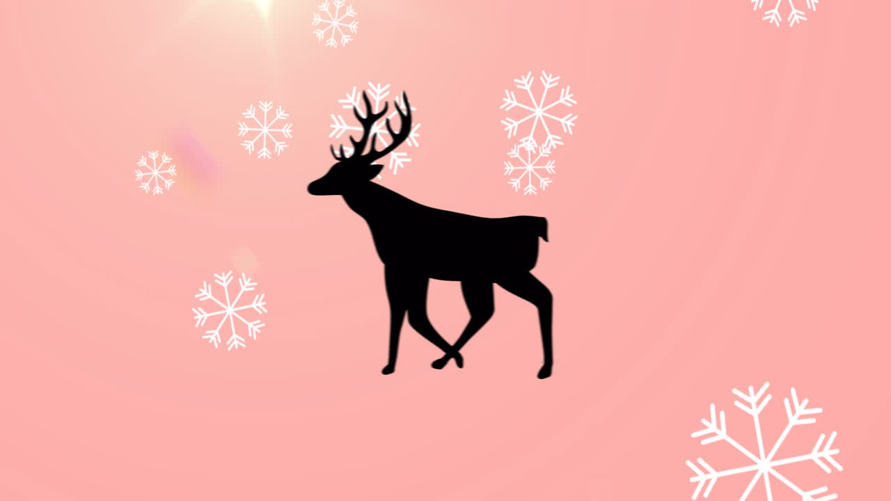 animación de renos sobre la nieve que cae