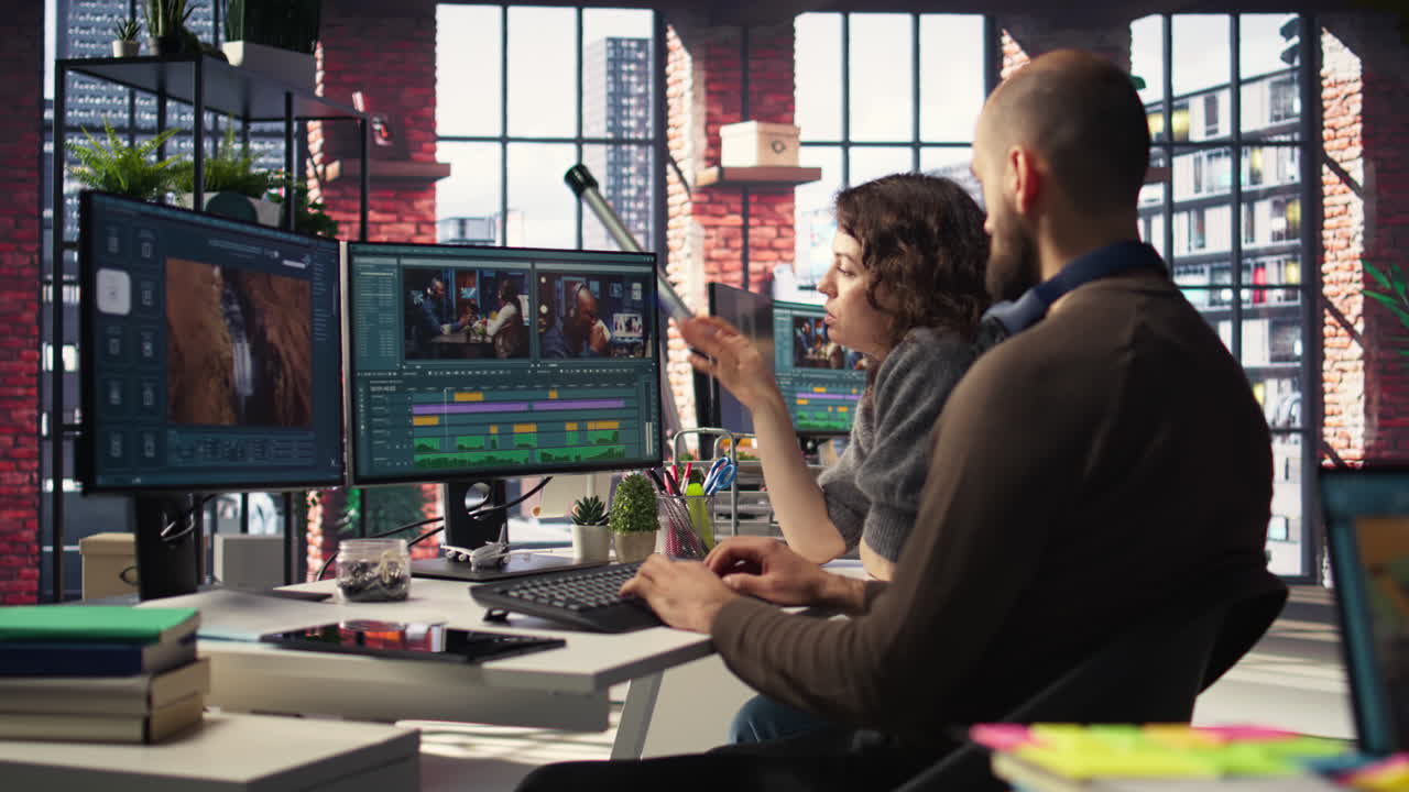 Man and woman filmmakers editing video shoot in post production
