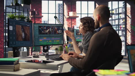 man and woman filmmakers editing video shoot in post production