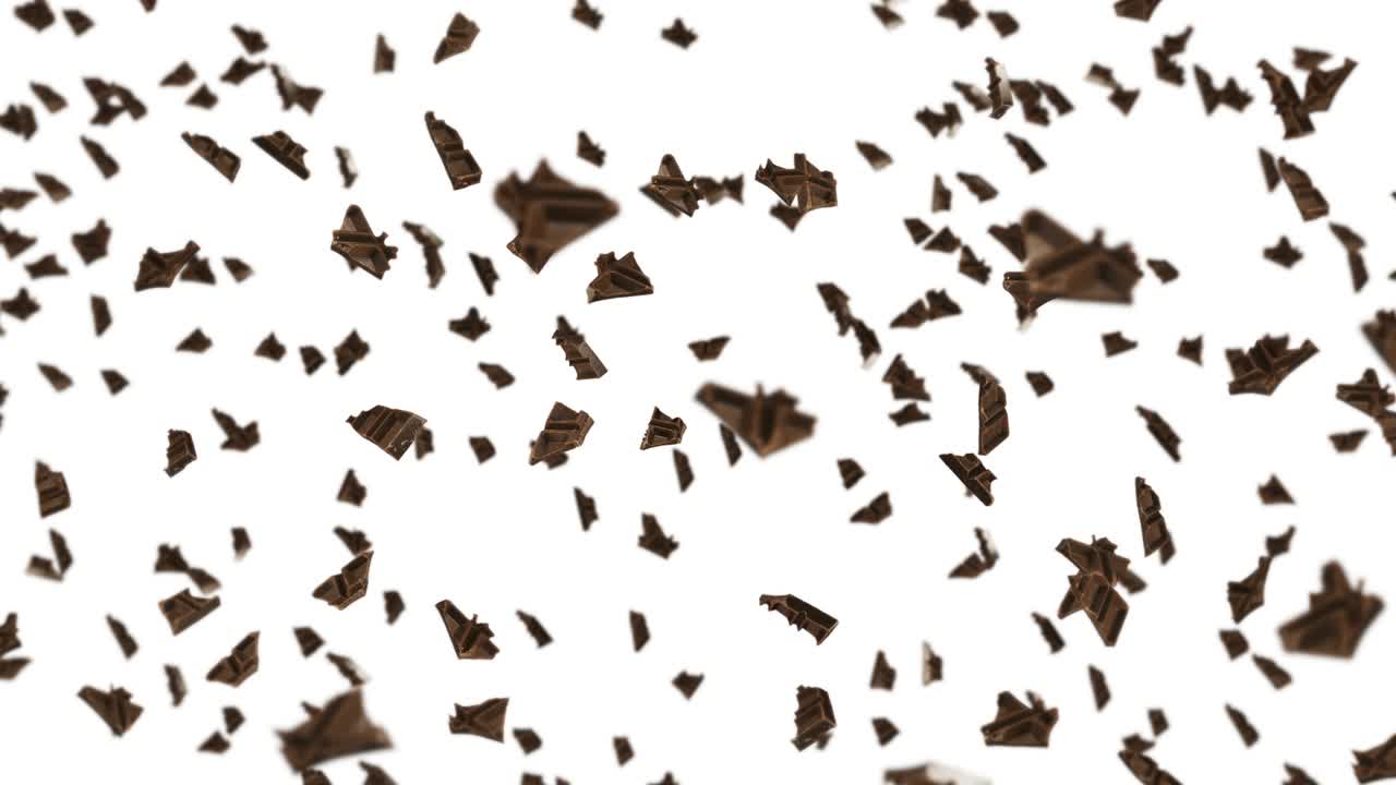 검은 바탕에 많은 초콜릿 조각을 날아. 음식과 과자. 우유와 어두운. 초콜릿 회전의 3d 루프 애니메이션.