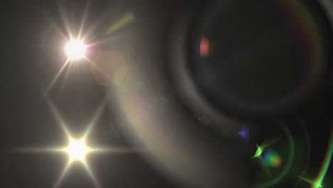 animation of light spots moving on black background