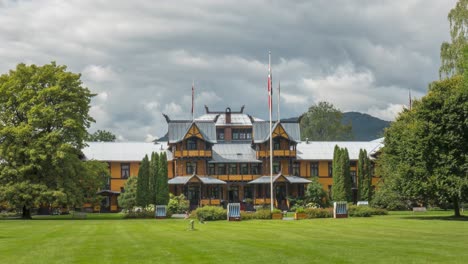 cloudy sky over historic dalen hotel in telemark, norway