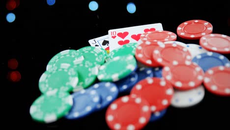 Playing-cards-and-casino-chips-on-poker-table-4k