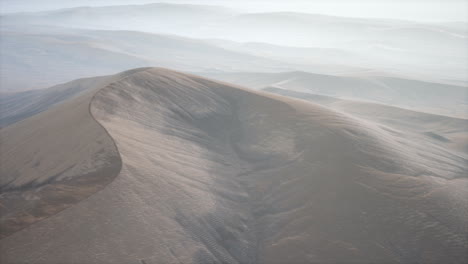 red sand desert dunes in fog