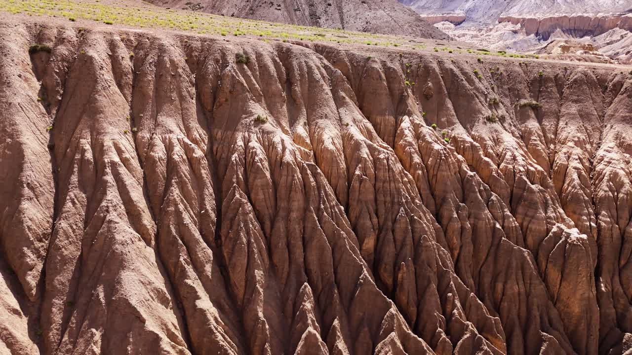 Unique sand formations in valley, known as moon land, drone aerial track laters of geological formations. India