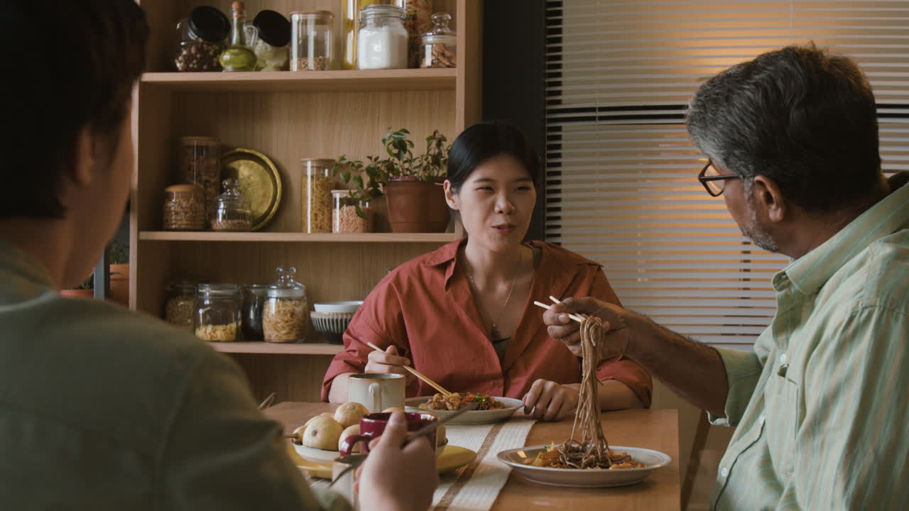 Family enjoying a delicious meal together at home