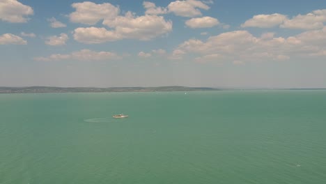 ship turns on the middle of the balaton lake, hungary, europe recorded with a dji drone 1080p 30fps