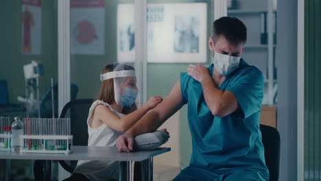 a child playing doctor gives an injection to a man in a medical setting