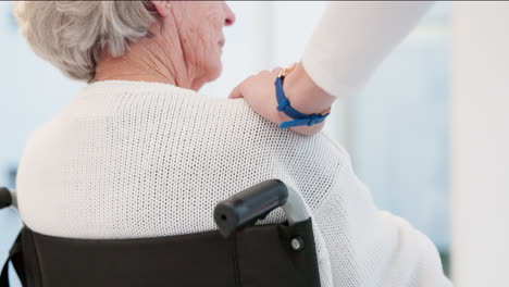 Hand,-shoulder-and-wheelchair-with-a-senior-woman