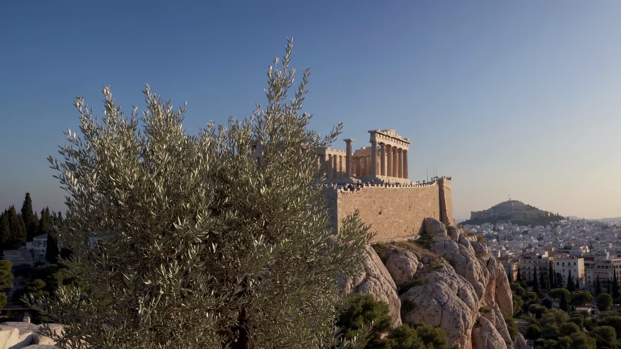 Scenic video concept of the Acropolis at sunset, captured from a low angle