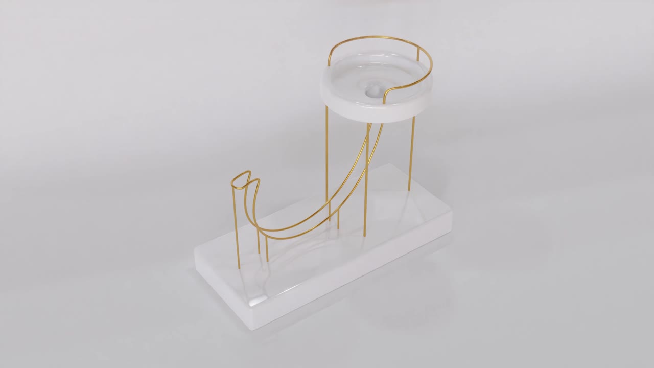 escultura geométrica abstracta blanca y dorada