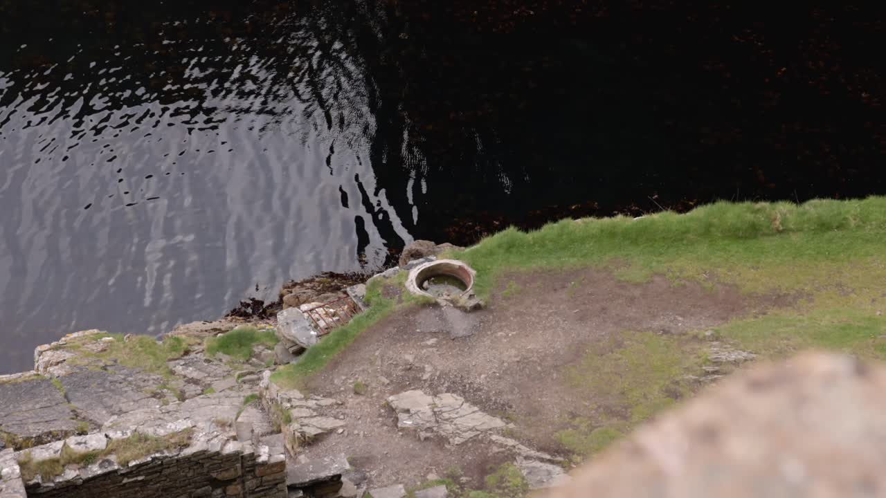 remaining stone buildings at the ocean inlet at the Whaligoe Steps