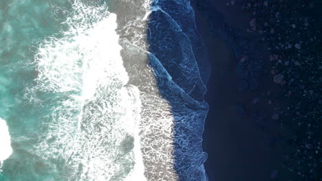 aerial overhead view over the shore of the virgin faneroque beach in agaete, on the island of gran canaria