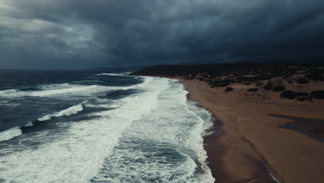 sunset after a storm on the sea in piscinas, sardinia