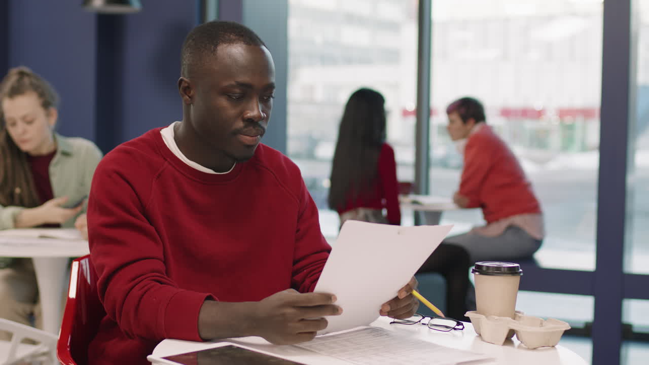African-American Businessman Posing in Office Cafeteria