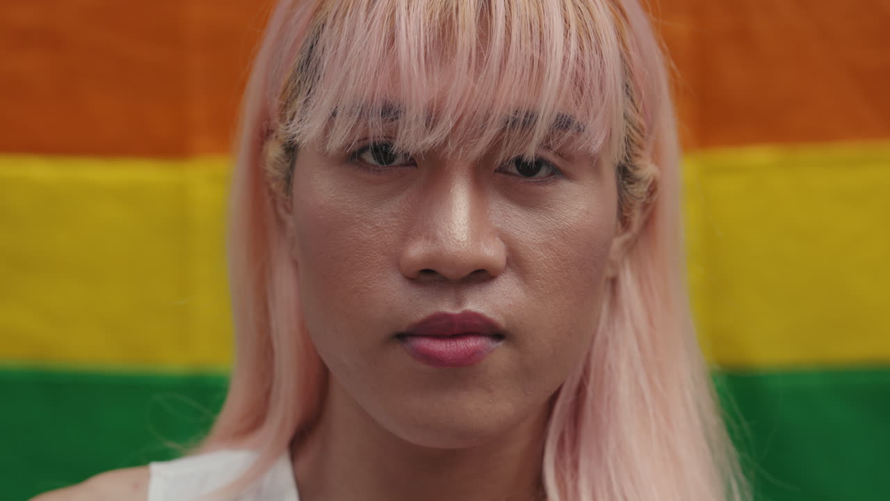 Transgender Woman Portrait in Front of a Pride Flag