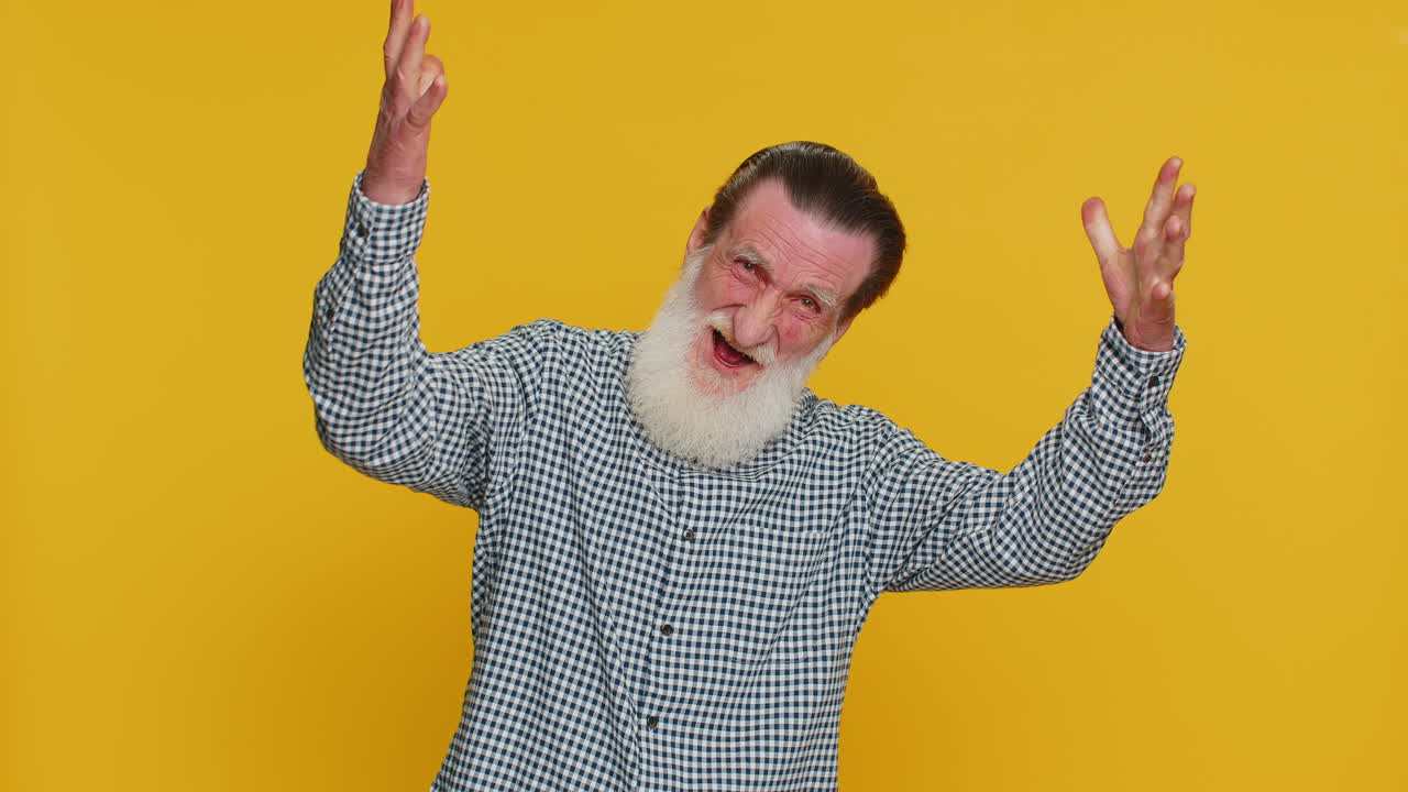 Happy senior man celebrating success winning birthday lottery jackpot goal achievement good news