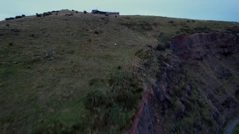 Aerial-toward-Christchurch-chairlift-revealing-diamond-harbour-at-dawn