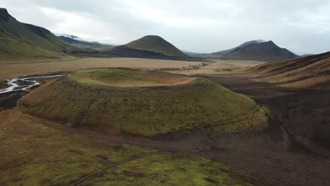 highlands of iceland, aerial with or crater of inactive volcano and glacial creek