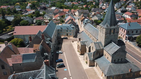 aerial view of a charming french village with a historic church