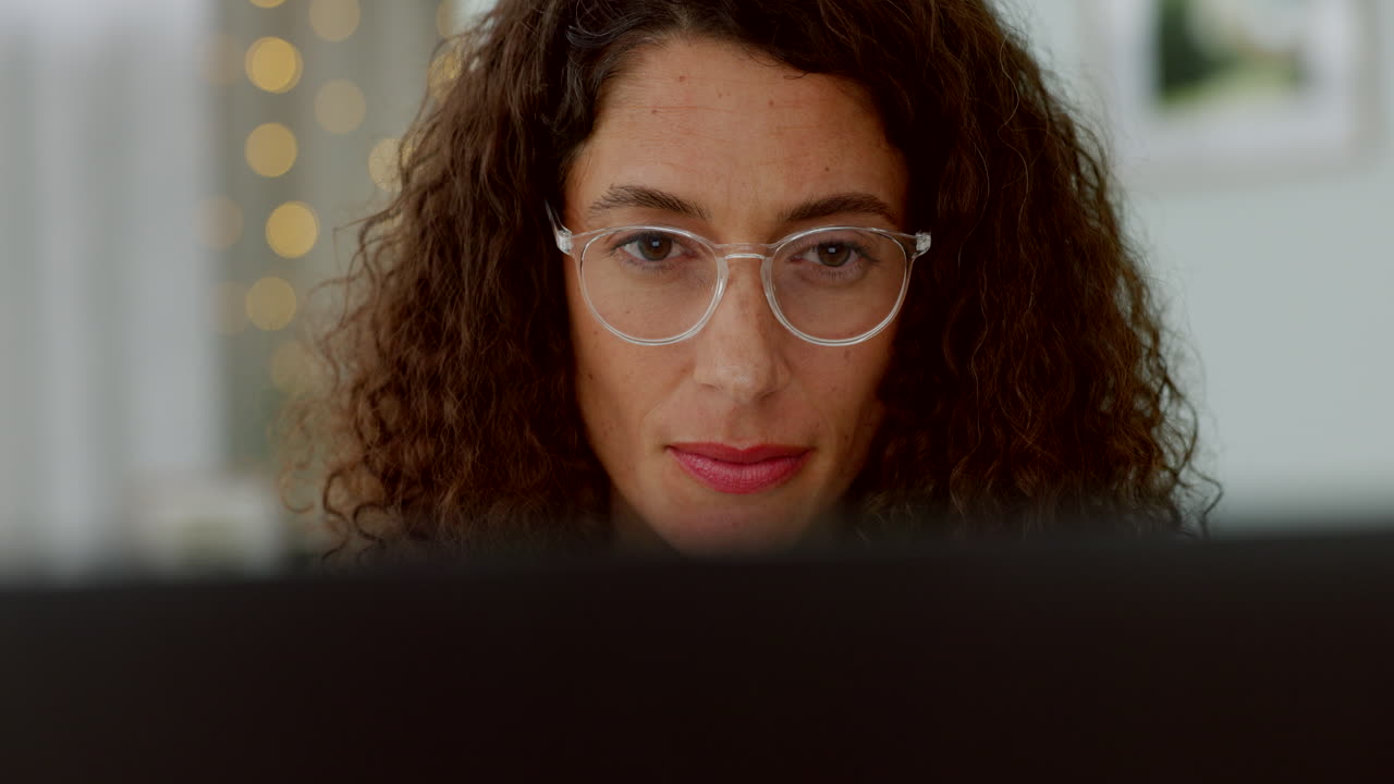 Laptop, thinking woman and glasses