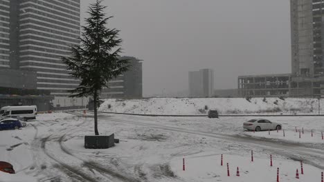 snowy city parking lot