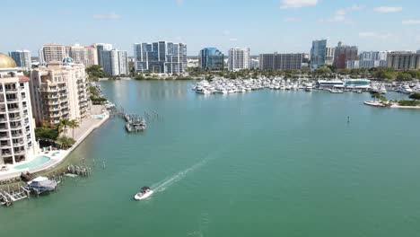 beautiful fast-moving forward aerial of downtown sarasota, florida, and the apartments and condominiums of golden gate point