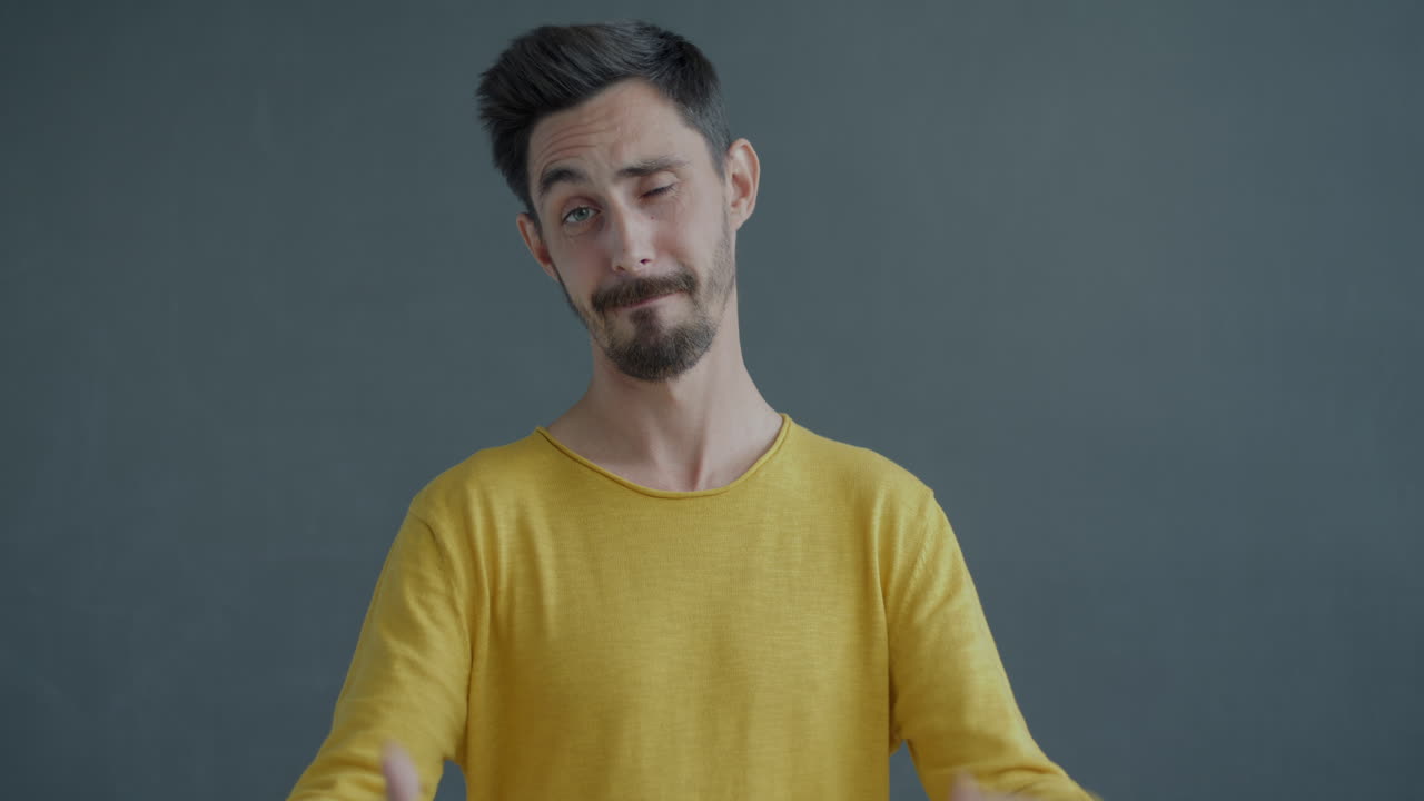 Man Expressing Confusion or Doubt