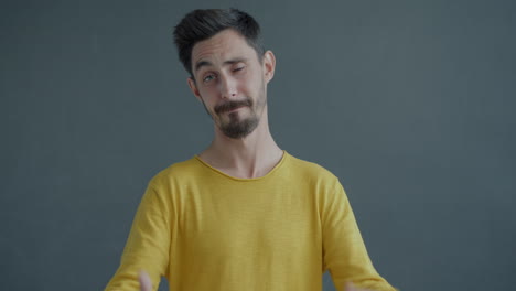 man expressing confusion or doubt