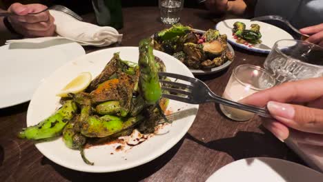 social candle light dinner share plates spicy edamame dish