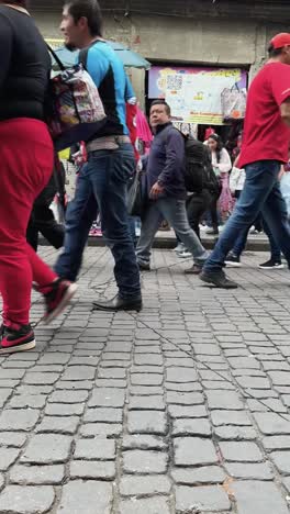 bustling afternoon timelapse captured on correo mayor street in heart of mexico city. vertical shot