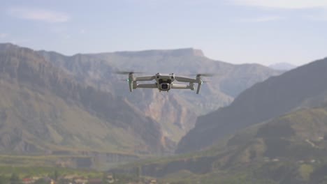 drone flying over mountains