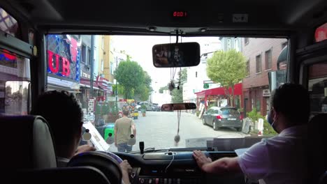 view from the front of a tour bus in istanbul, turkey, showcasing the dynamic city streets offering a unique perspective of the bustling urban environment and rich cultural heritage.