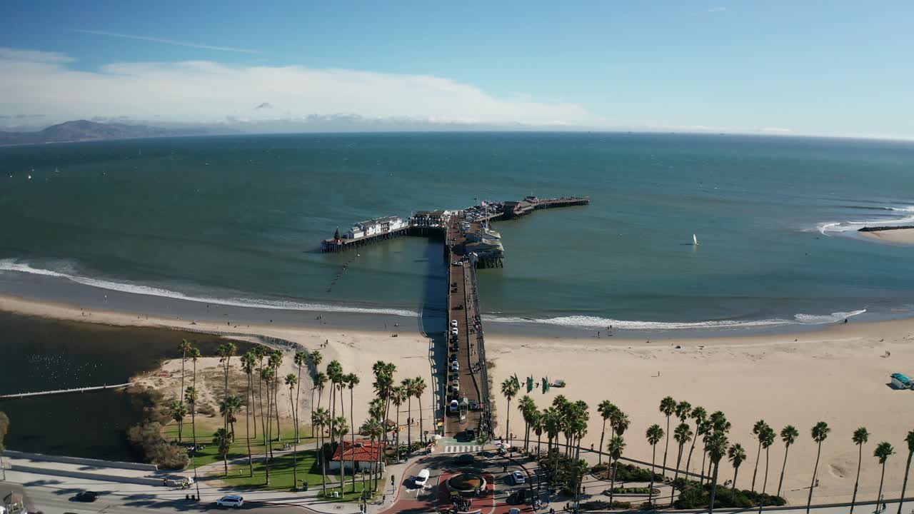 Aerial descending close-up shot of Stearns Wharf in Santa Barbara, California. 4K