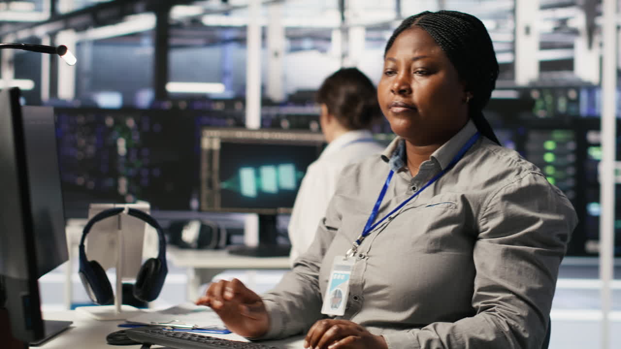 Vertical video Data center expert doing software updates, verifying machine learning parameters