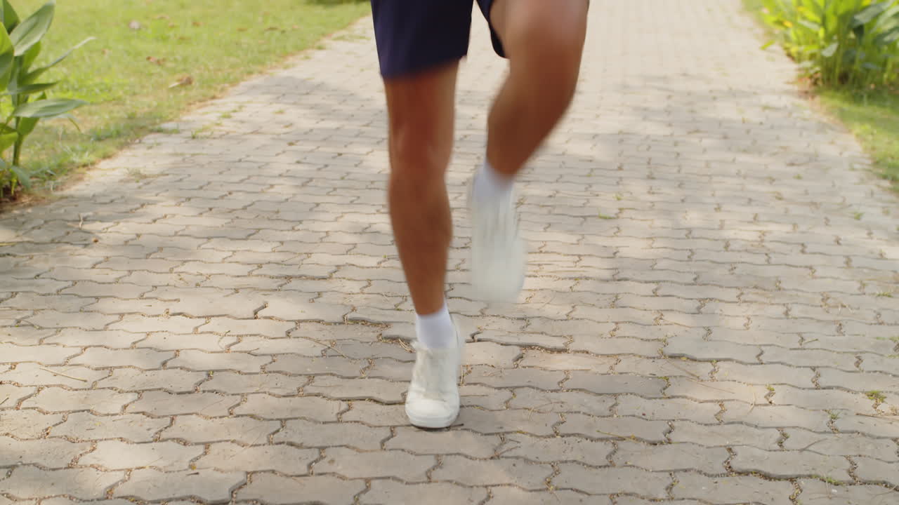 Motivated Athlete Doing Jumping Exercise Outdoors