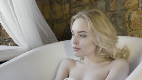 woman relaxing in a bathtub