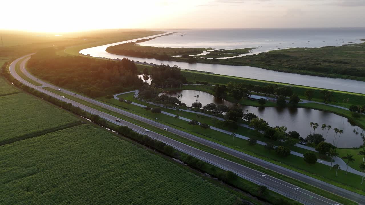 gorgeous sugar cane farms at sunset in the southernmost part of Lake Okeechobee and water management system in Florida