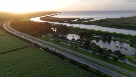 gorgeous sugar cane farms at sunset in the southernmost part of lake okeechobee and water management system in florida