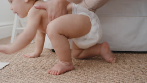 happy baby crawling toddler exploring with curiosity at home with mother gently picking up her infant helping child motherhood responsibility 4k