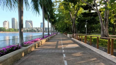 time-lapse of a tranquil riverside pathway