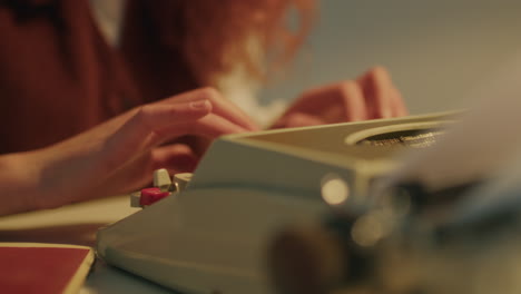 woman write on typewriter