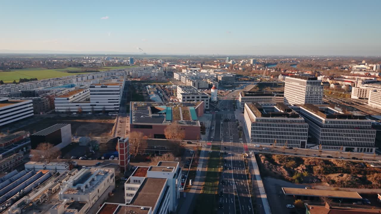 Sustainable Rooftop Landscape: Aerial View of Passive House Installation and Railway Infrastructure in Heidelberg's Bahnstadt District