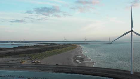 Windturbines-during-sunset-on-the-island-Neeltje-Jans,-the-Netherlands