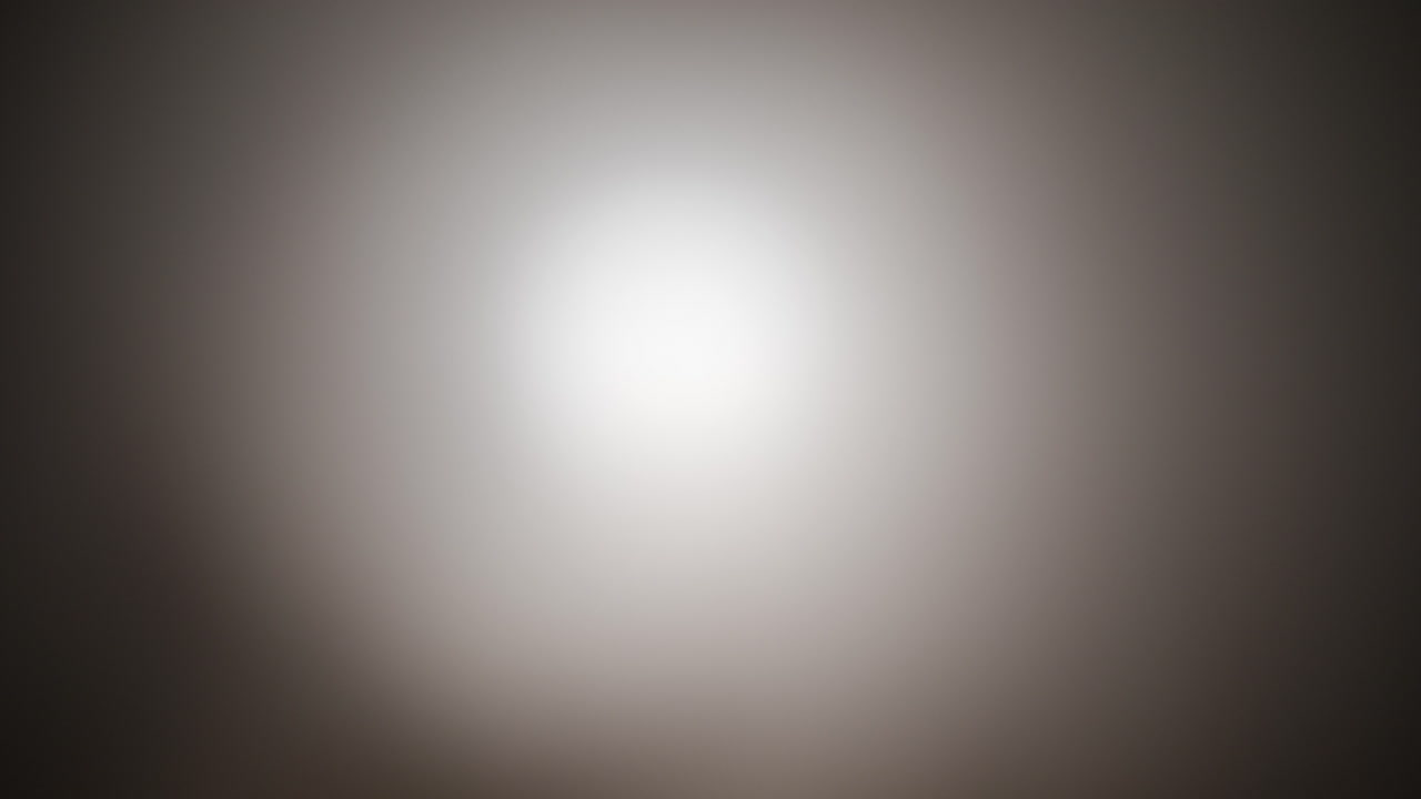 Strange, glowing, alien, UFO orb light, ghost or moon light with smoke and fog for halloween or science fiction, sci-fi background