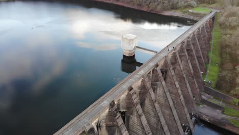 aerial of high walled concrete dam at wimbleball lake