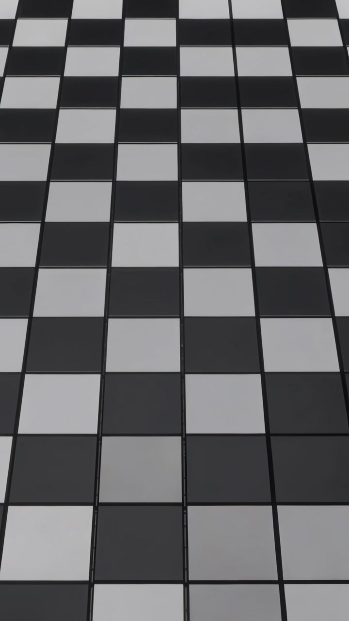 Vertical video: Forming raised tiles grid after T-block appearing on dotted base revealing checks