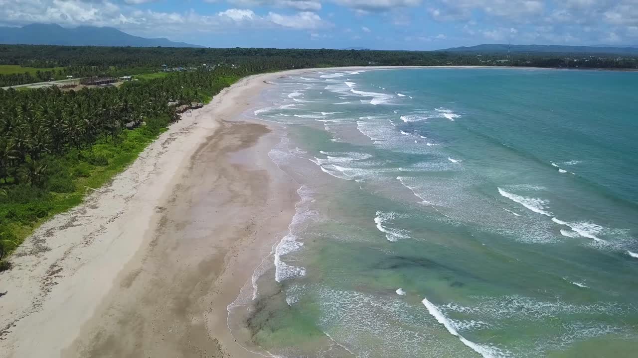 Aerial view of tropical sandy beach and blue ocean Bicol Philippines  4k