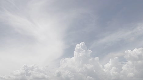 clear and soft blue sky, relaxing day, mild and light weather, forming a white cloudy landscape